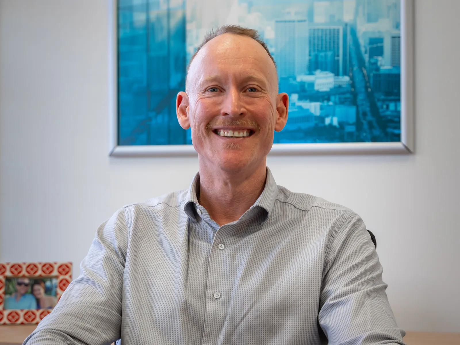 Gavin Harrigan at his desk at the Quantum Finance Australia office in West Leederville