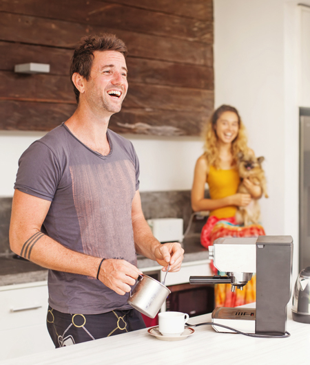 The owners of a new home in the kitchen