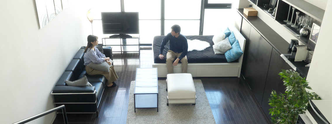 A couple talking Inside a suburban home