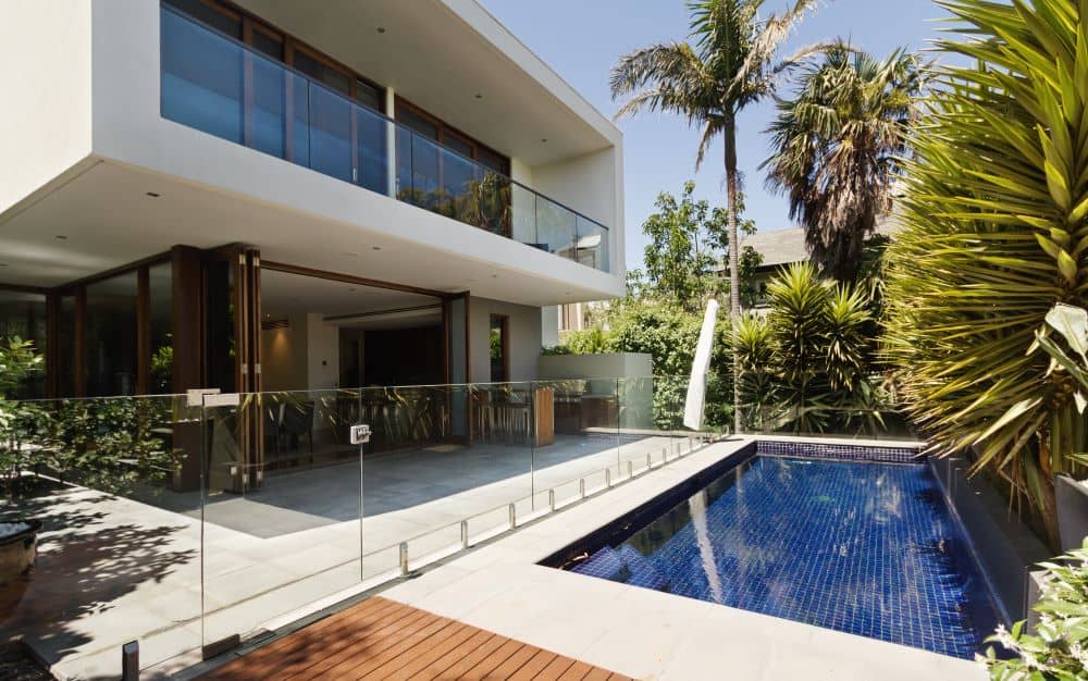 House with backyard swimming pool.
