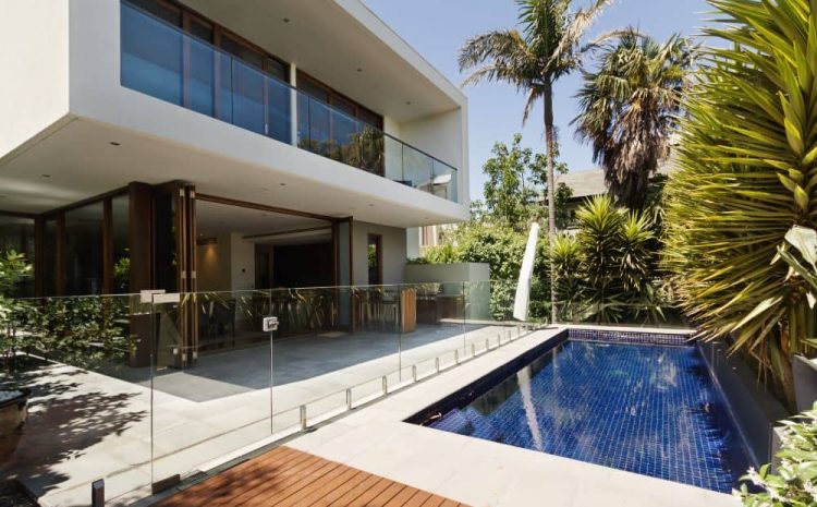 House with backyard swimming pool.